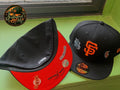 Gorra New Era 59FIFTY de los San Francisco Giants cuenta con un parche lateral conmemorativo de la Liga Nacional y una visera inferior de color naranja.